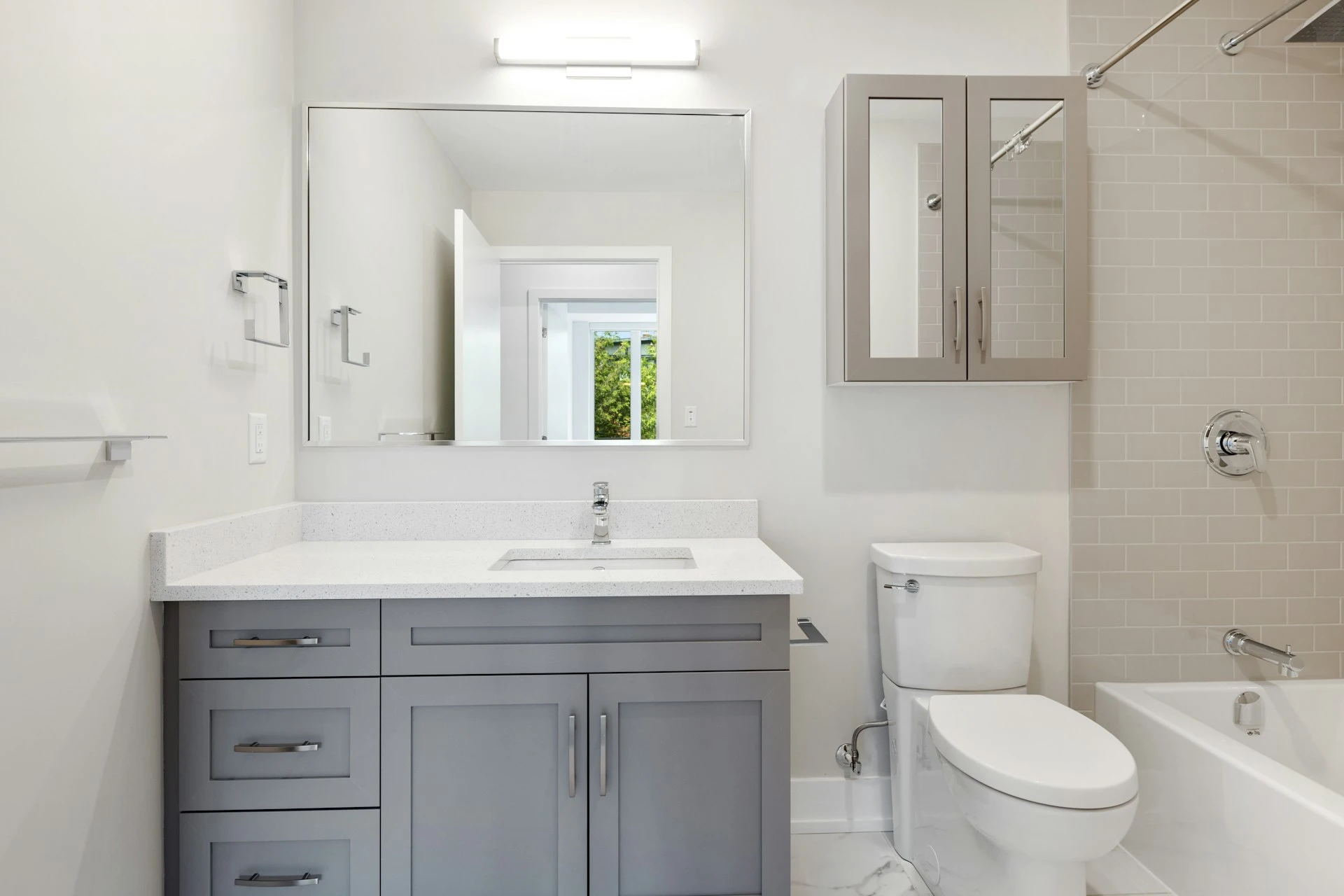 Modern Marble Oasis with Concealed Plumbing & Glass Partition