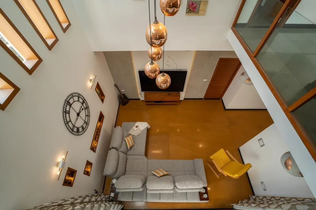 Modern Living Room with Cream Sectional Sofa and Slatted Wall